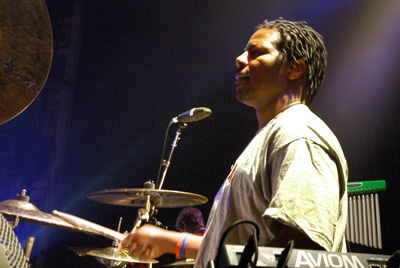 Musician using Aviom Mixer on Stage