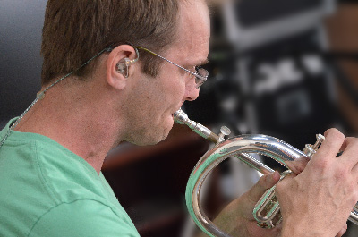 Horn Player using In-Ear Monitors